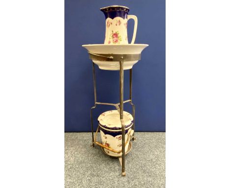 WEDGWOOD &amp; CO IMPERIAL PORCELAIN TOILET SET cream glazed and decorated with roses, the blue border decorated with gilt sw