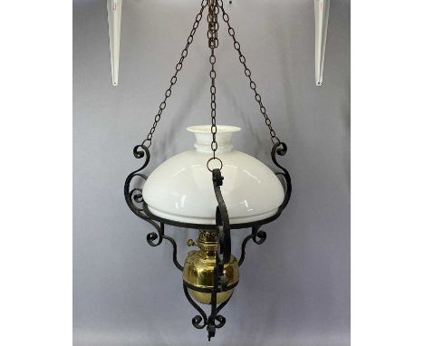 HANGING OIL LAMP late 19th Century, Lampe Veritas brass reservoir with single burner, scrolled wrought metal frame with suspe