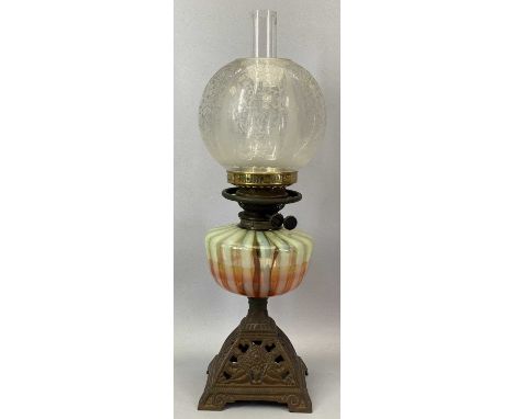 VICTORIAN OIL LAMP with pierced cast metal base, circular vaseline glass reservoir, Duplex twin burners with etched globular 