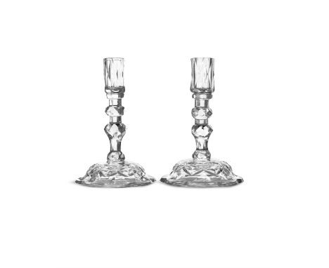 A PAIR OF FLAT-CUT CANDLESTICKS IN IRISH 18TH CENTURY STYLE AND OF THE PERIOD, with tall trellis-cut sconces double knobbed s