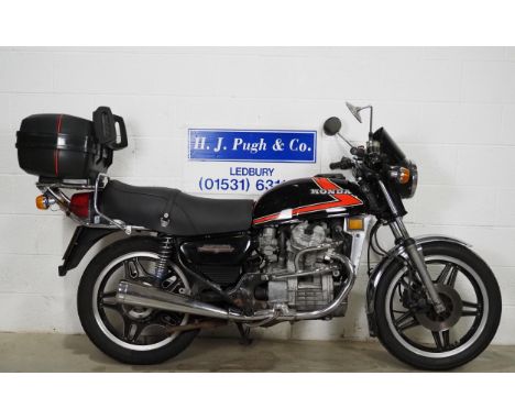 Honda CX500 motorcycle. 1982. 498cc. Engine runs on easy start but requires attention. Carburettors need a full service. Come