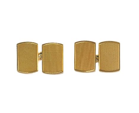 A pair of 18ct hallmarked gold engine-turned cufflinks. Maker AC Co, stamped ALBION, London 1963, 9.6g.