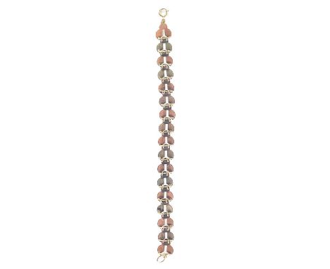 A 9ct bi-colour rose and white gold trefoil link bracelet. Each link with engine turned decoration, each stamped 9ct, length 