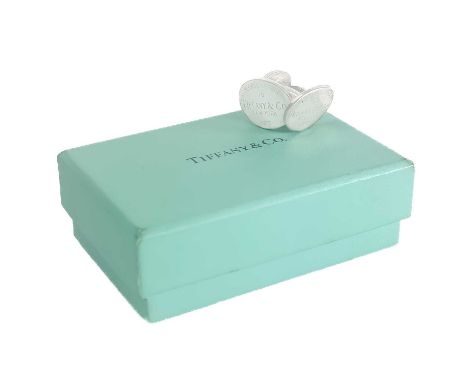 Tiffany & Co 'Return To Tiffany' oval sterling silver cufflinks. With original box. 14.5g.One has a couple of small dings to 