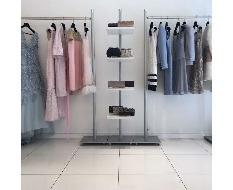 From the Knightsbridge atelier of the designer Jacques Azagury Four modular retailers shelf display stands.  Includes poles, 