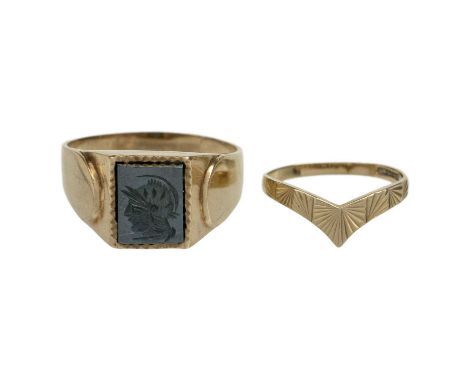 A 9ct gentleman's signet ring and a 9ct wishbone ring. The signet ring size V, the wishbone size K, 6.7g.