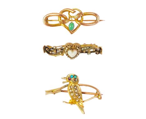 Three gold stone set brooches. One Edwardian brooch set with a heart shaped white opal and seed pearls, width 33mm; a hollow 