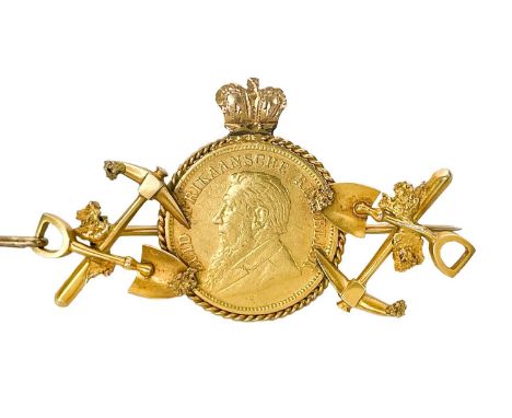 A South African 1/2 Pond coin and gold nugget prospectors brooch. The 1894 1/2 Pond wire twist mounted surmounted with a crow