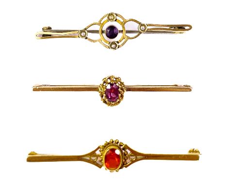 Three 9ct gold gem set bar brooches.  One set with an amethyst and seed pearls, base metal pin, length 52mm; another with a t