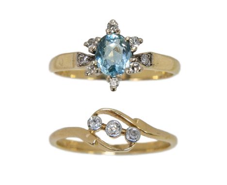 Two 18ct diamond set rings. One is a crossover ring set with three small diamonds in a milegrain setting, size O; together wi