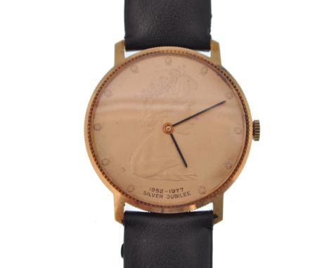 An 18ct / 750 marked cased gents watch celebrating the Queens Silver Jubilee, 17 jewel Swiss movement, the dial with a portra