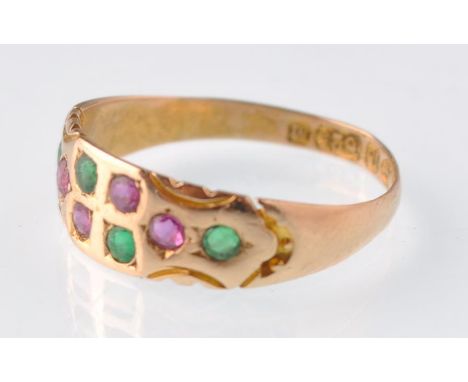 A late Victorian 15ct gold 8 stone emerald and ruby gypsy ring.&nbsp; Hallmarks for Chester 1895. Weight 2.0g