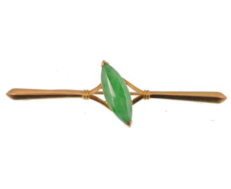 A Chinese yellow gold and jade bar brooch with central Jade navette cabochon to centre with c-clasp pin verso. Chinese markin