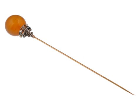 A&nbsp; 19th century French gold pearl and diamond hat stick pin. The pin being primarily of gold rising to silver gallery ha