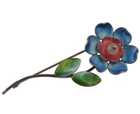 An early 20th century Art Nouveau stirling silver and enamel ladies flower brooch having glass bead centre. Pin Verso. Size 7