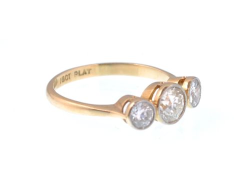 An 18ct gold and platinum three stone diamond ring having approx 1ct of diamonds with the central brilliant cut stone of appr