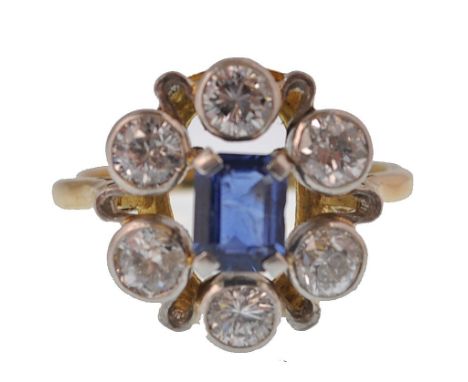 An 18ct gold sapphire and diamond cluster ring.&nbsp; The diamonds approx 1.2cts. Central cushion cut sapphire measures appro