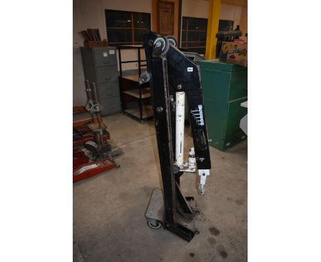 A SEALY one ton folding engine crane