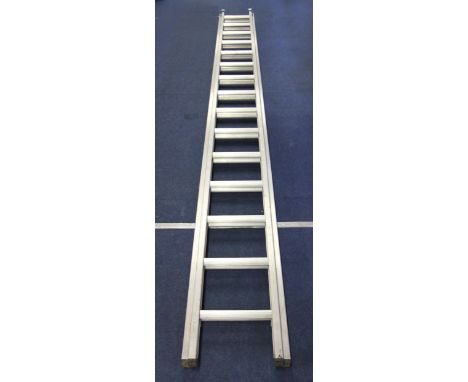 A 15 rung extending alloy ladder opens to 7m G++ 
