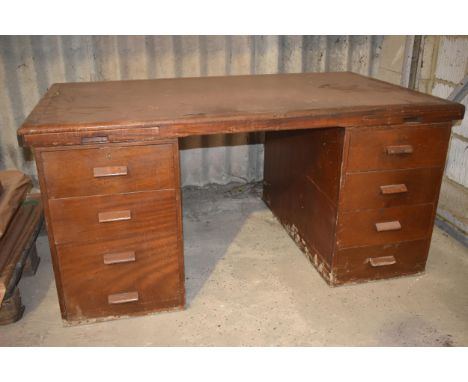 A vintage pedestal office desk