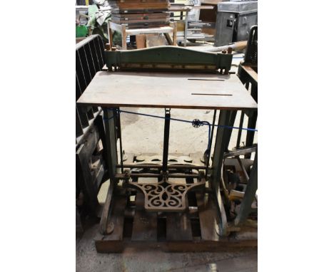 A vintage printer's letterpress perforating machine and a punching machine