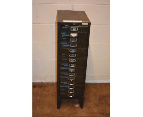 A vintage metal storage unit with 15 drawers containing nuts, bolts and other fixings