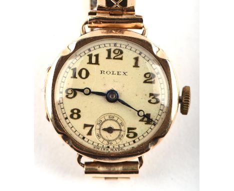 Rolex a Ladies Gold wristwatch, the signed dial, with Arabic numeral hour markers within a minute track, subsidiary seconds d