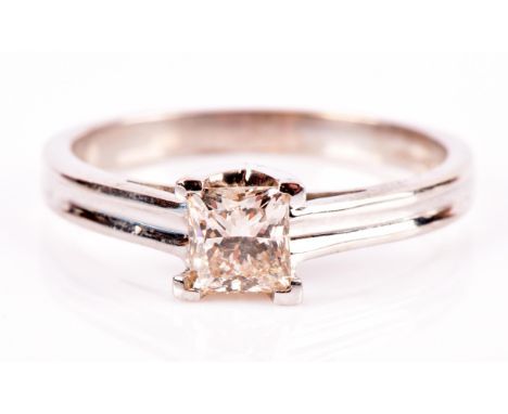 Diamond single stone ring by Shimansky of South Africa, set with a princess cut diamond, measuring 4.82 x 4.49mm, four claw s