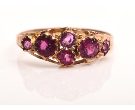 Antique cluster ring set with six round cut paste stones with an engraved shank in 9 ct, size NCondition Report:  gross weigh