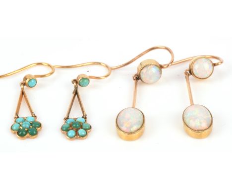 A pair of opal drip earrings set with round cabochon cut and oval cabochon cut opals, mount testing as 14 ct, with hook fitti