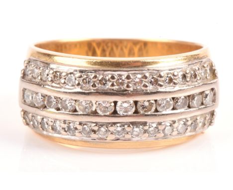 Three row diamond ring, round brilliant cut diamonds, channel and grain set, weighing an estimated 1.00 carat, mounted in sta