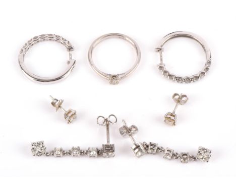 Modern diamond set jewellery, including a pair of diamond drop earrings designed as a diamond set stud, suspending three furt