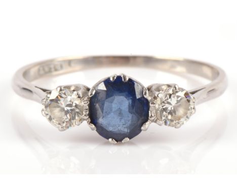 Sapphire and brilliant cut diamond three stone ring in white metal stamped "PLAT", ring size S 1/2.Condition Report:  Weight 