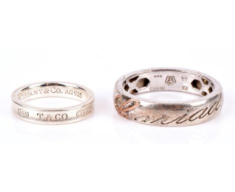 A Tiffany & Co. ring in sterling silver, ring size K 1/2, and a Clogau sterling silver ring engraved "Cariad" with an Edinbur