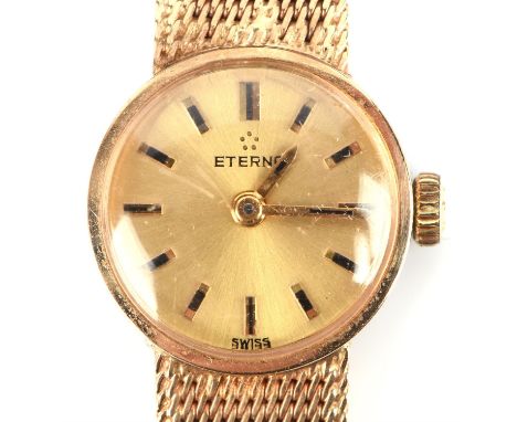 Eterna a Ladies Gold wristwatch the signed champagne dial with baton hour markers, fitted with a seventeen jewel manual wind 