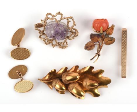 An amethyst crystal brooch, a pair of oval engine turned cufflinks and a tie pin, all in 9 ct, together with an oak leaf broo