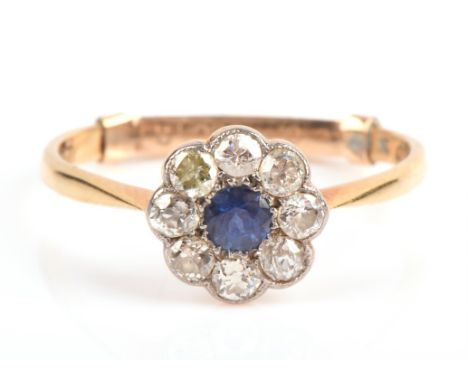 Antique sapphire and diamond ring, with a central round cut sapphire surrounded by old cut diamonds, set in stamped 18 ct, ri