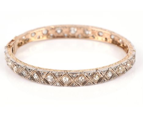 Old cut diamond set bangle, set with rows of old and rose cut diamonds around the whole bangle, with a total estimated weight