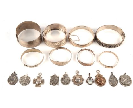 Antique and vintage silver jewellery including four child's bangles, three hinged bangles and one buckle fastening bangle, a 