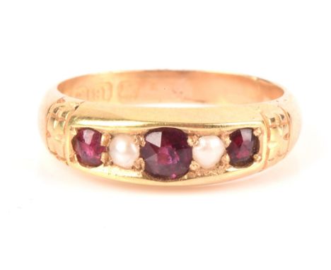 Victorian garnet and pearl five stone ring in 18 ct yellow gold, hallmarked Birmingham 1894, ring size M.Condition Report:  W