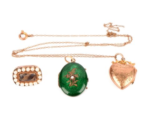Green enamel and pearl photo locket, testing as 14 ct gold, a 9 ct gold heart shaped photo locket hallmarked Birmingham 1912 