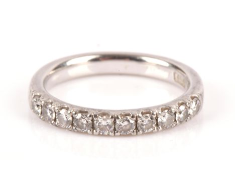 Diamond half eternity ring, set with round brilliant cut diamonds, estimated total diamond weight 0.60 carat, mounted in plat