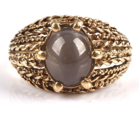 1970's cats eye chrysoberyl ring in hallmarked 9 ct gold, dated 1972, maker's stamp SJ, oval shaped cabochon cut cats eye chr