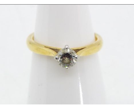 A hallmarked 18 carat yellow and white gold diamond solitaire ring, approximately .41 pts, size K, approx 3.38 gm