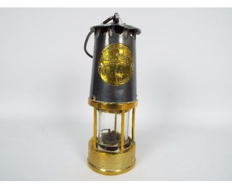 A Protector Lamp &amp; Lighting Co Type MC40 safety lamp.