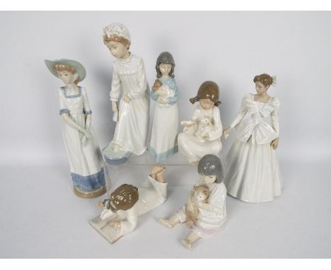 A collection of Nao figurines, children and ladies, largest approximately 32 cm (h). [7]