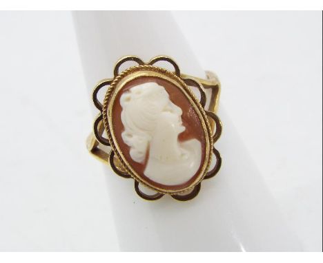 A yellow metal cameo ring, marks rubbed, presumed 9 carat gold, size L, approx 3.00 gm (all in)