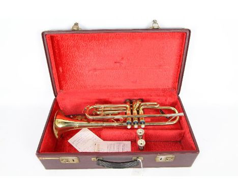 A Zenith Mk III trumpet by J R LaFleur, contained in plush lined case.