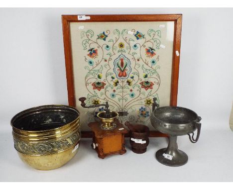 A Walker &amp; Co Homeland, pewter pedestal fruit bowl with twin dragon handles and planished decoration (26 cm height), wood