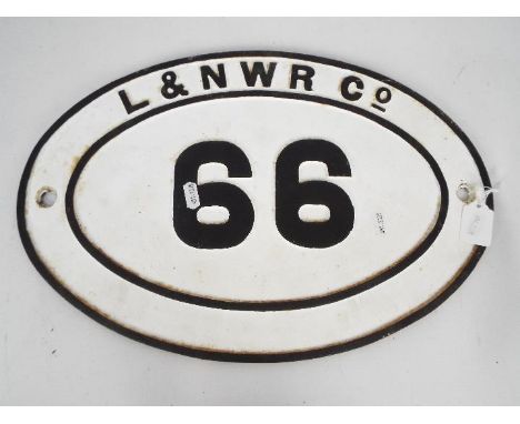 Railwayana - An oval bridge plate, 66, marked L &amp; N W R Co, approximately 30 cm x 45 cm.